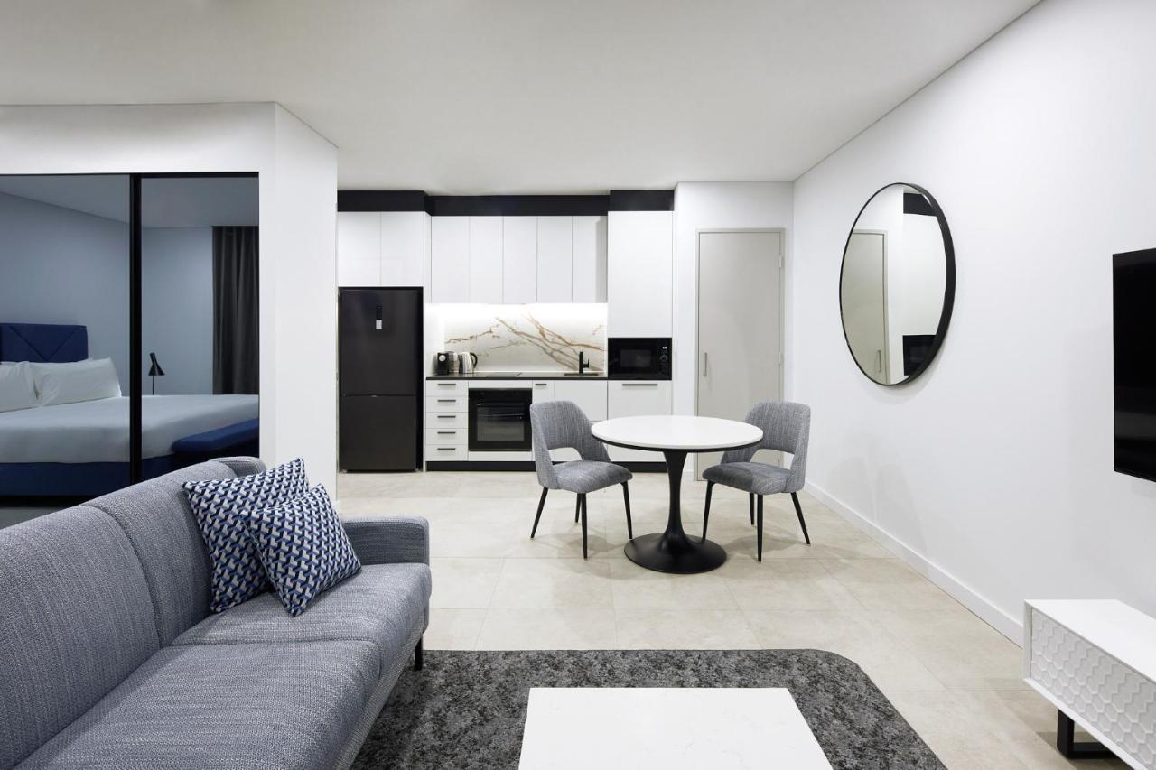 Meriton Suites Liverpool Exterior foto A typical apartment at The Standard